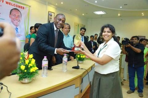 NIMS Painting competition_prize receiving from UN General Secretary Dr. Yumkella